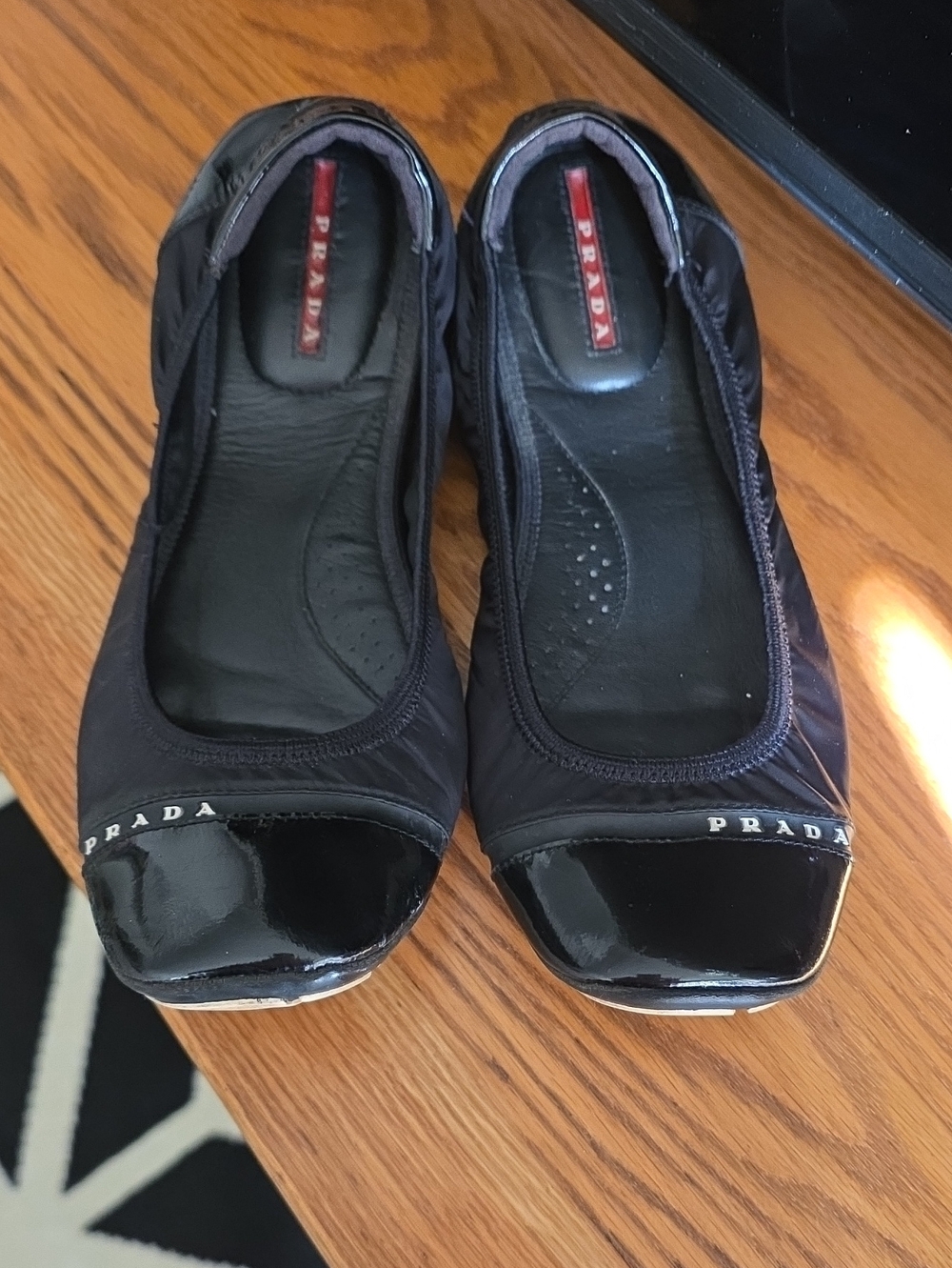 Prada Black Ballet Flats with Patent Toe Cap